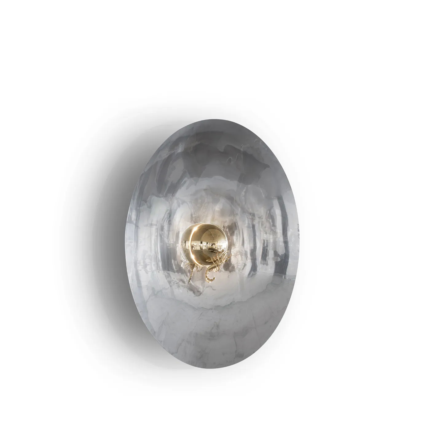Metamorphosis mirror with a sleek, round gold frame, exuding luxury and modern elegance.