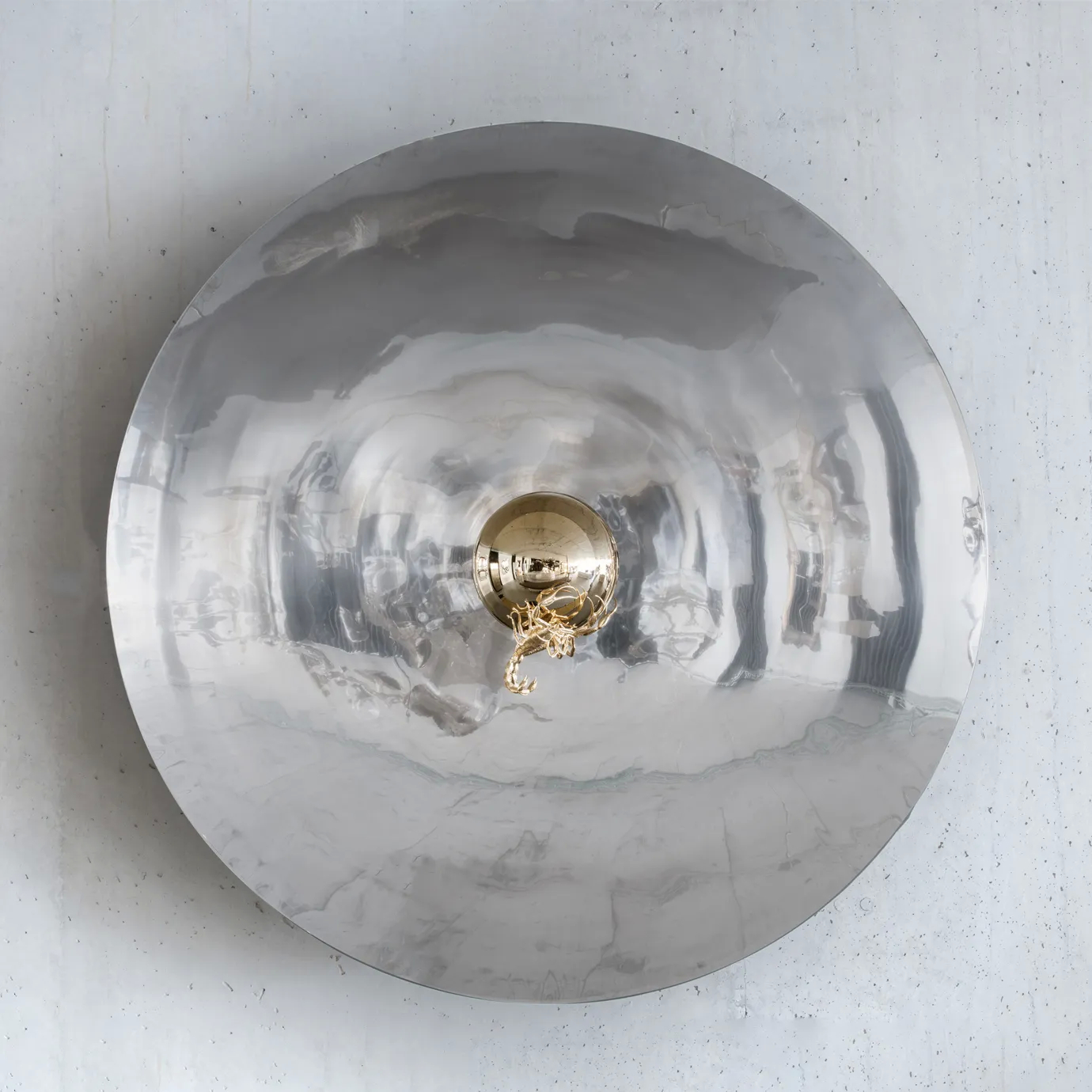 Elegant Metamorphosis mirror with a striking gold frame, showcasing sophisticated artistry.