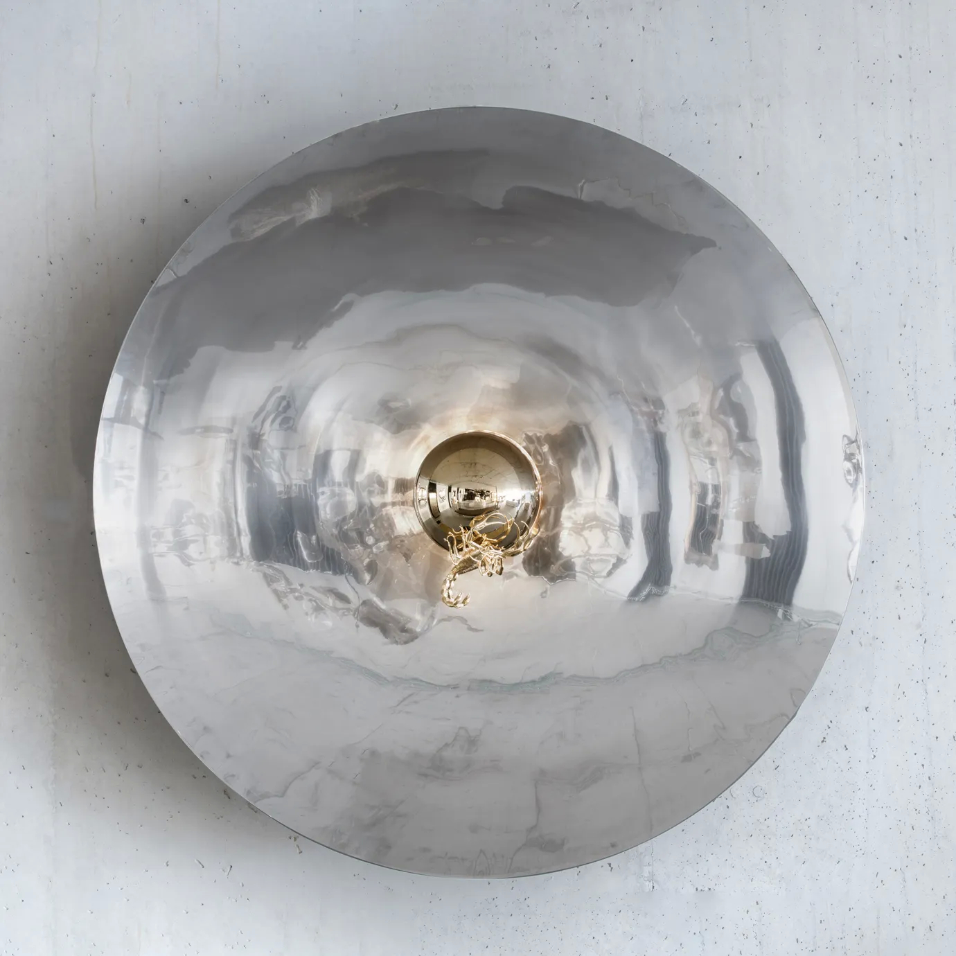 Luxurious Metamorphosis mirror with an intricate gold frame, designed to elevate any space.