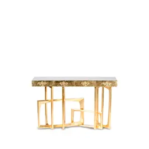 Front view of the elegant console with a glossy finish and striking geometric gold accents.