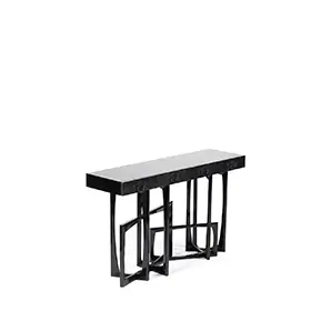 Side view of the sleek black console with a minimalist design and gold detailing.