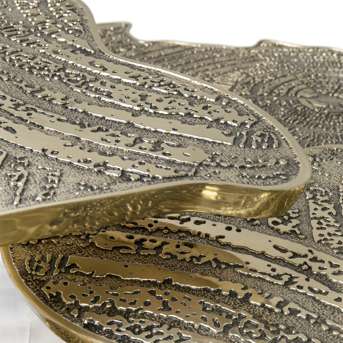 Top view highlighting the smooth marble surface and the sculptural gold base.