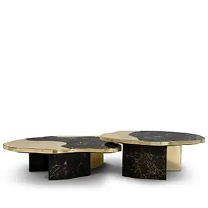 Ophelia center table with Portoro marble top and gold-plated brass base.