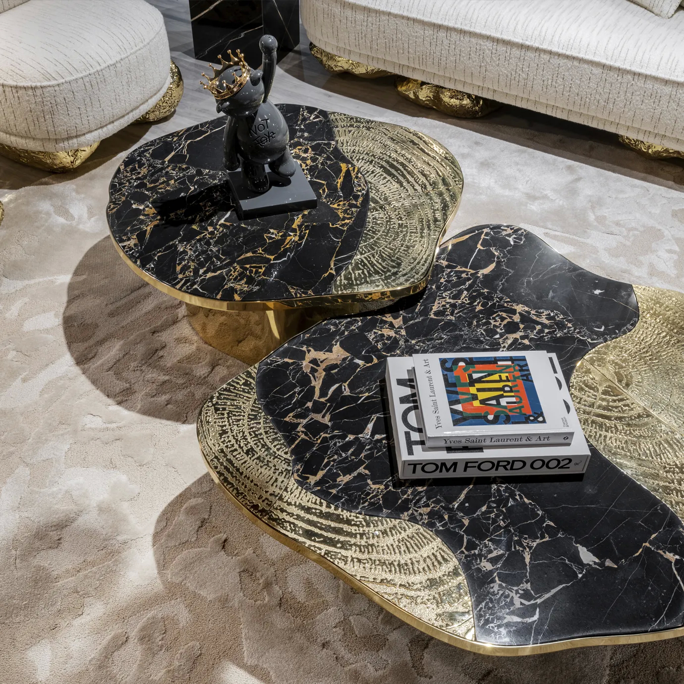 Ophelia center table featuring Portoro marble top and gold-plated brass base.