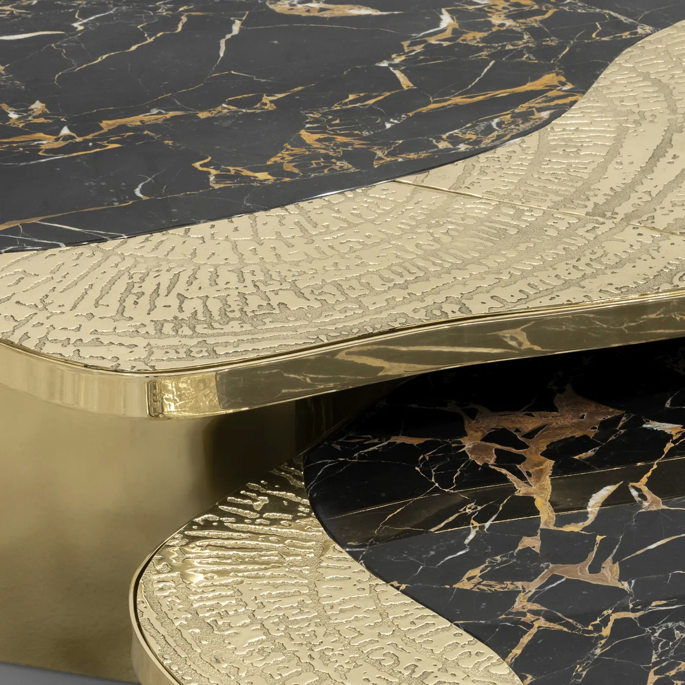 Ophelia center table with Portoro marble top and gold-plated brass base.