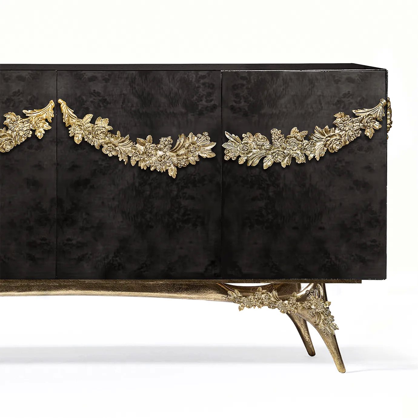 Majestic sideboard with black walnut root veneer, gold garland, and sculptural brass base.