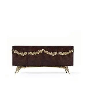 Majestic sideboard with walnut root veneer and elegant gold detailing.