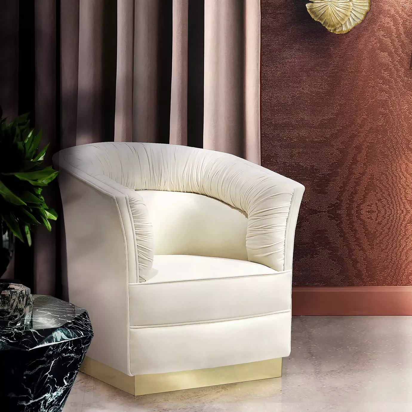 Elegant Lovely Armchair with golden metal base and cream fabric upholstery with ruched details in a sophisticated interior.