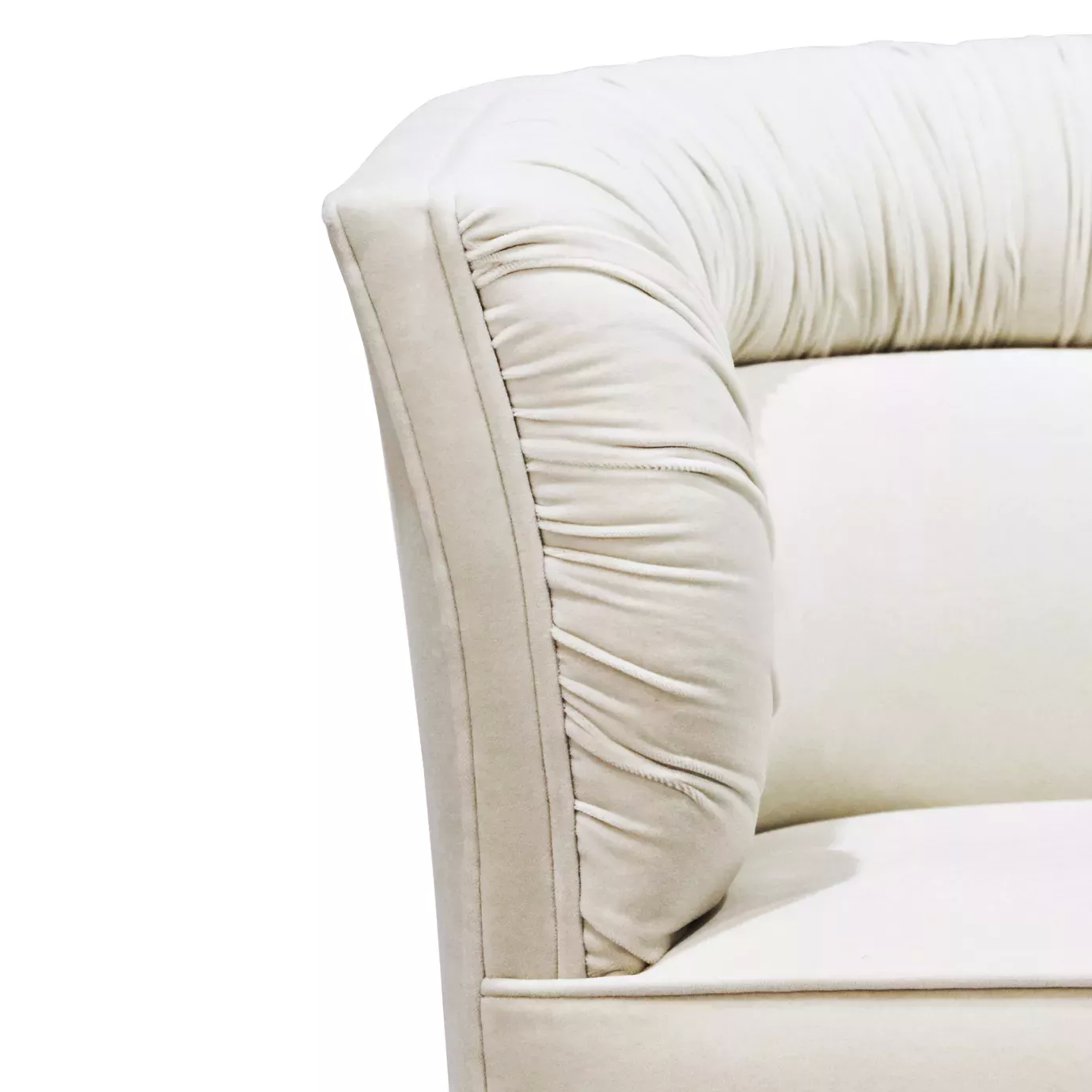 Elegant close-up of the ruched detail of the cream fabric of the Lovely Armchair
