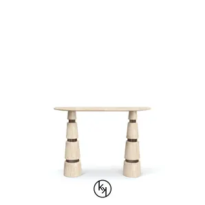 Avalanche Console: Travertine marble top and striking conical legs with details create a sleek, modern design.