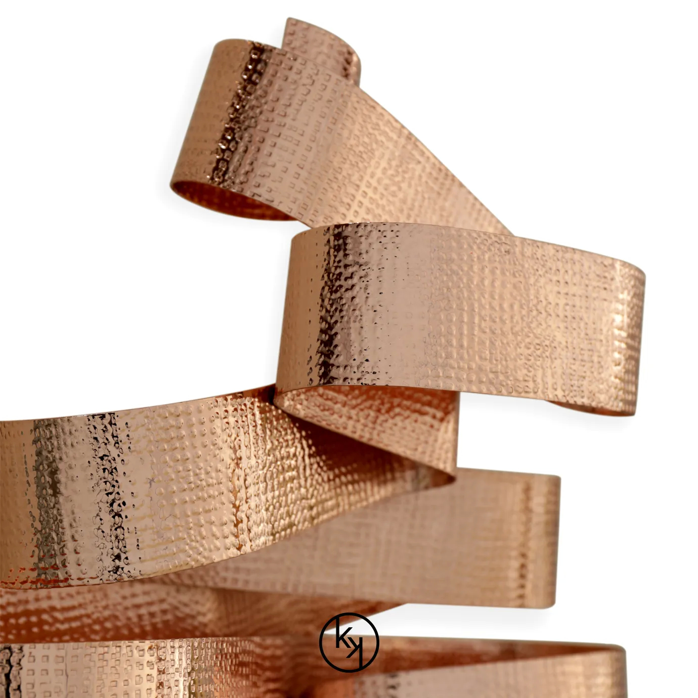 Elegant Chloe Sconce with a sculptural design of wavy ribbons in a textured copper tone.