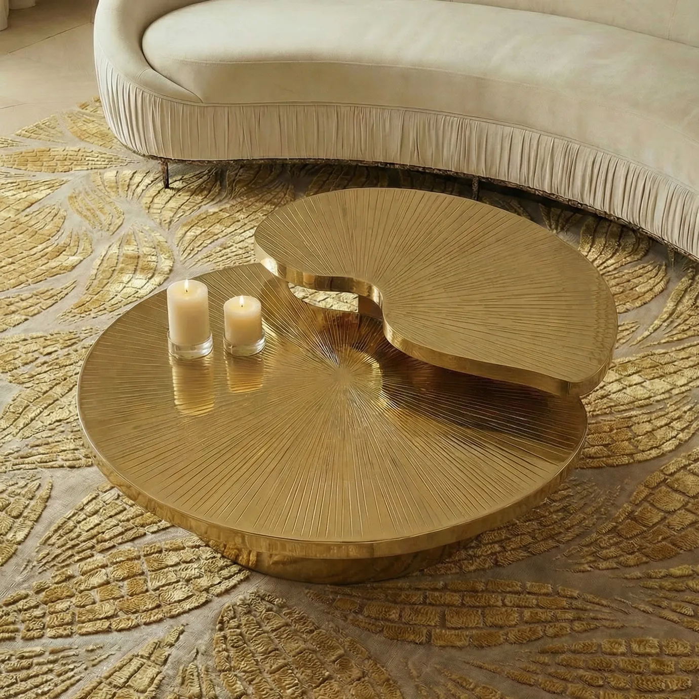 KOKET Terra Wheat Rug styled in a living room, highlighting wheat-gold sculpted texture beneath a gold coffee table