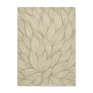 KOKET Terra Sand rug featuring a sculptural organic pattern in soft beige and ivory tones, handcrafted for luxury interior design.