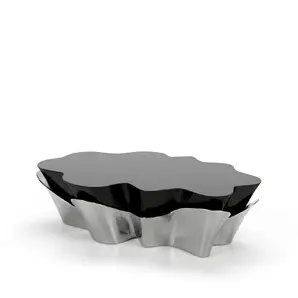 Yasmine Coffee Table by KOKET with polished silver metal base and glossy black lacquer top, sculptural luxury coffee table design.