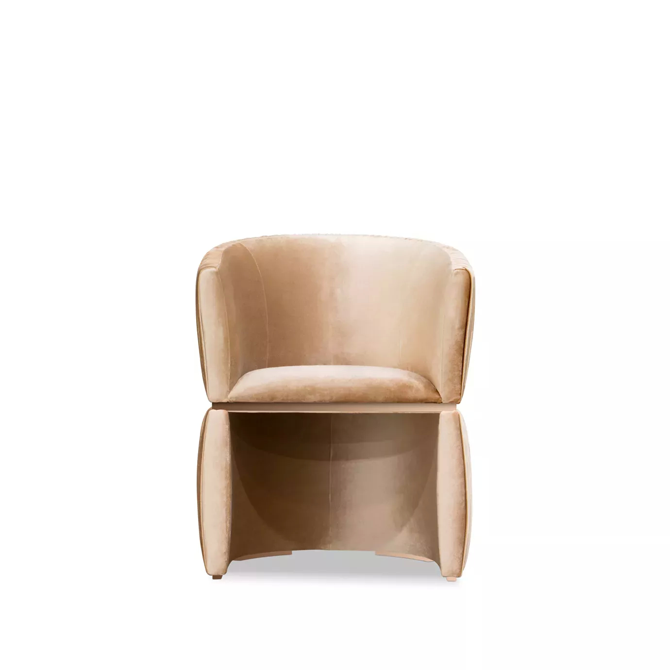 Elegant Cuff Chair upholstered in peach-toned velvet with pleated details and a wraparound design.
