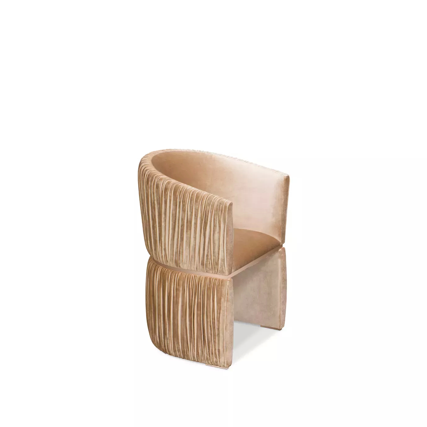 Elegant  side view of Cuff Chair upholstered in peach-toned velvet with pleated details and a wraparound design.