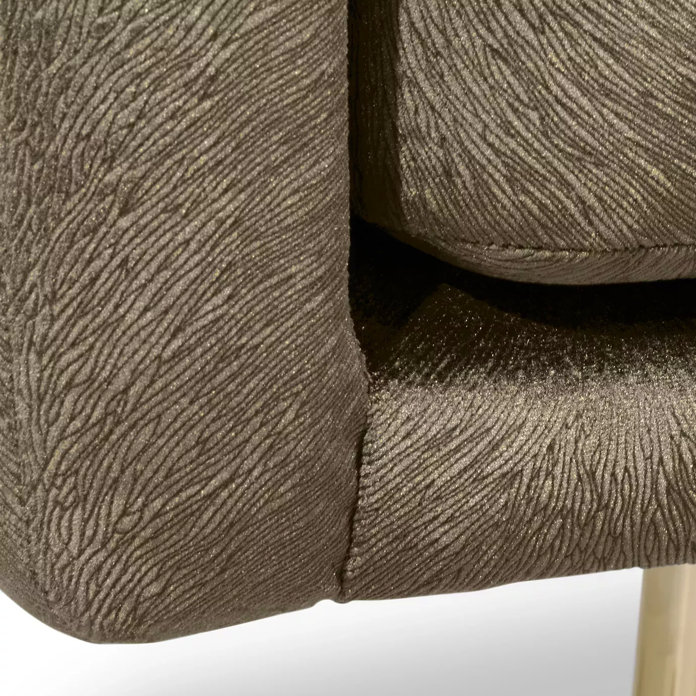 Elegant close-up of the brown velvet texture of the seat and armrest of the Hemma Office Chair