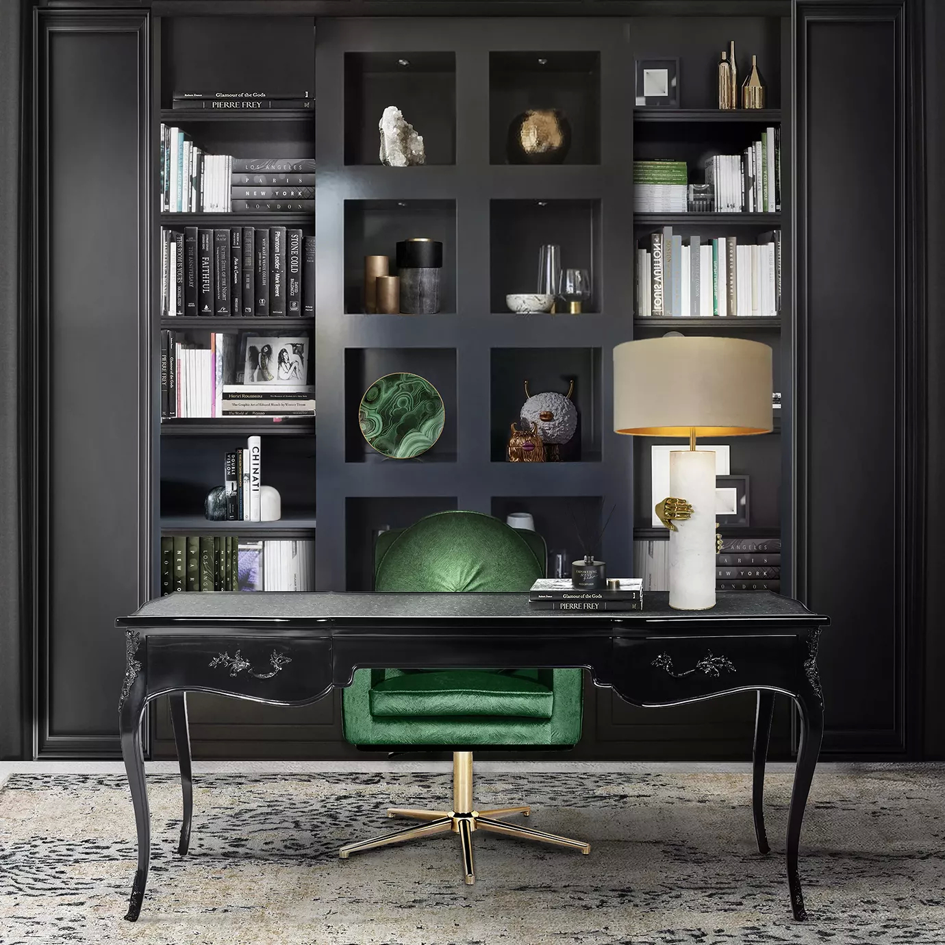 Elegant office with a Hemma Office Chair in green velvet, an ornate black desk, and dark bookshelves filled with books and decorative objects.