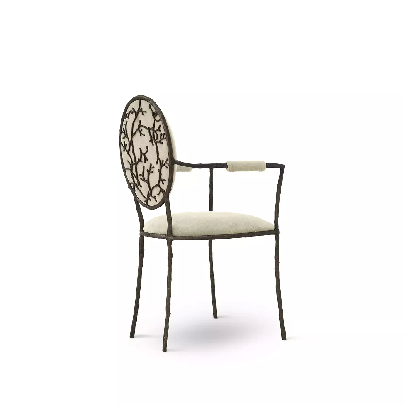 Highlighting its elegant aged brass backrest resembling branches, the Enchanted Arm Dining Chair features a luxurious cream upholstery.