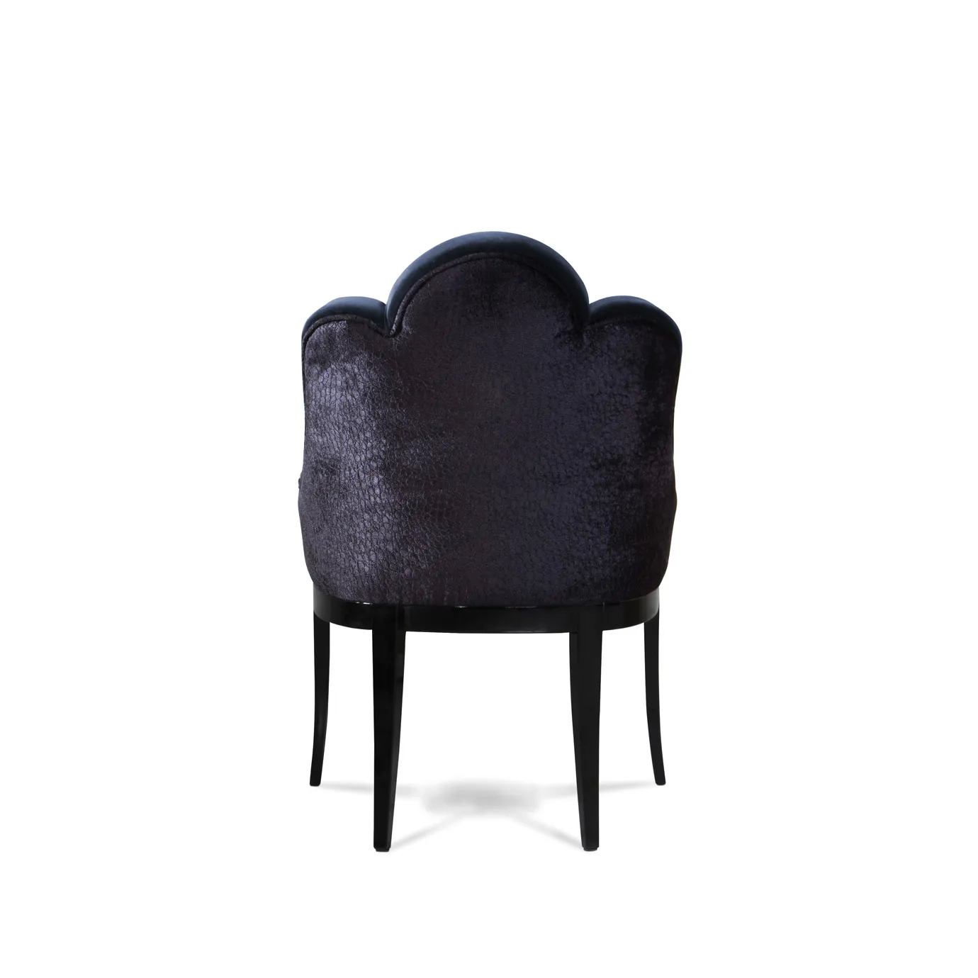 Elegant back view of Anastasia Dining Chair upholstered in deep blue velvet with a textured side detail and dark legs.