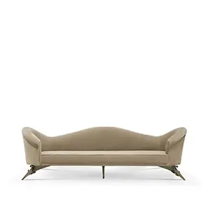 Elegant Colette Sofa with a golden metal base featuring floral details and soft beige velvet upholstery.