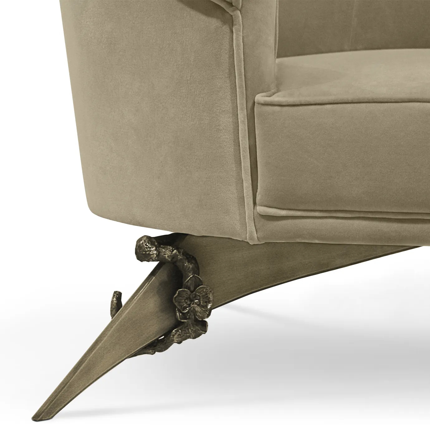 Elegant close-up of the golden metal base with floral details and the soft beige velvet upholstery of the Colette floral metal base Sofa.