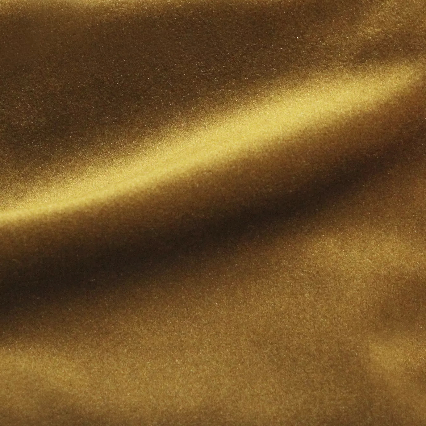 Sample of Cozy Velvet fabric in caril color — soft velvet texture with a warm golden-yellow tone, ideal for cozy interior spaces.