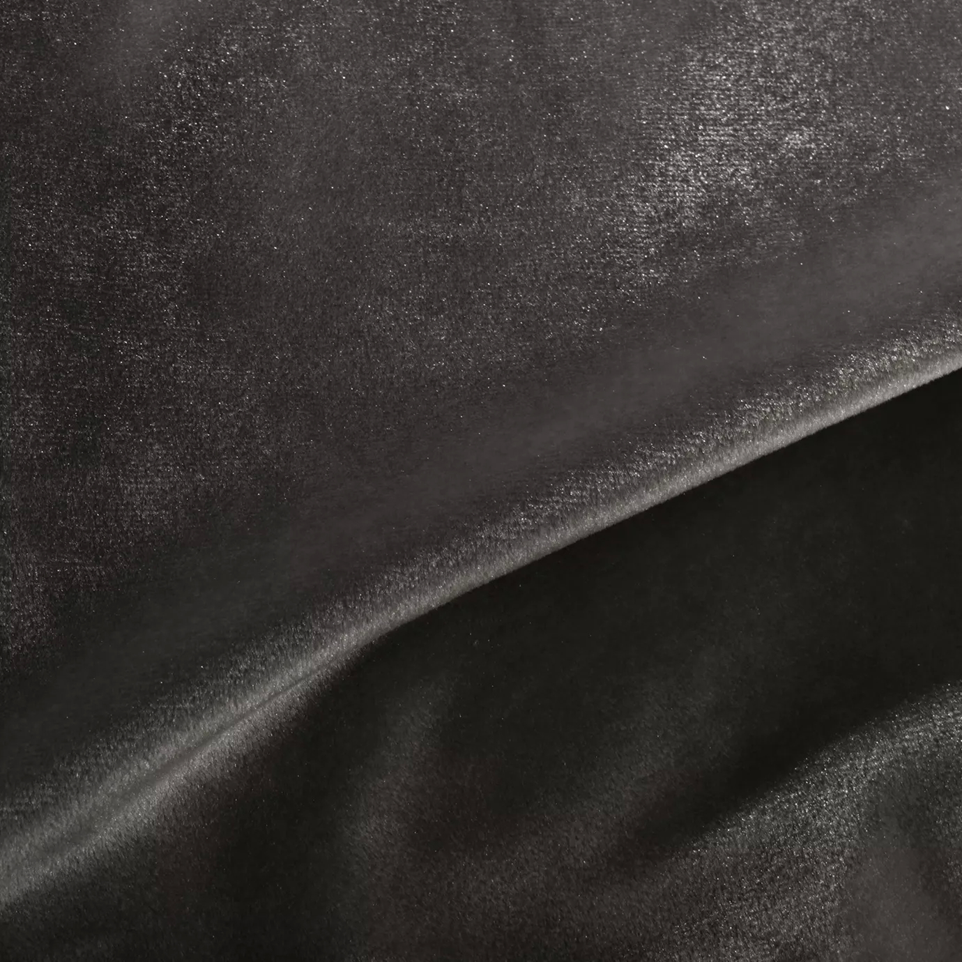 Elegant close-up of a Silky Velvet 487 fabric swatch in a luminous and soft gray-brown tone, showcasing its smooth texture and the delicate folds that highlight its understated sophistication.