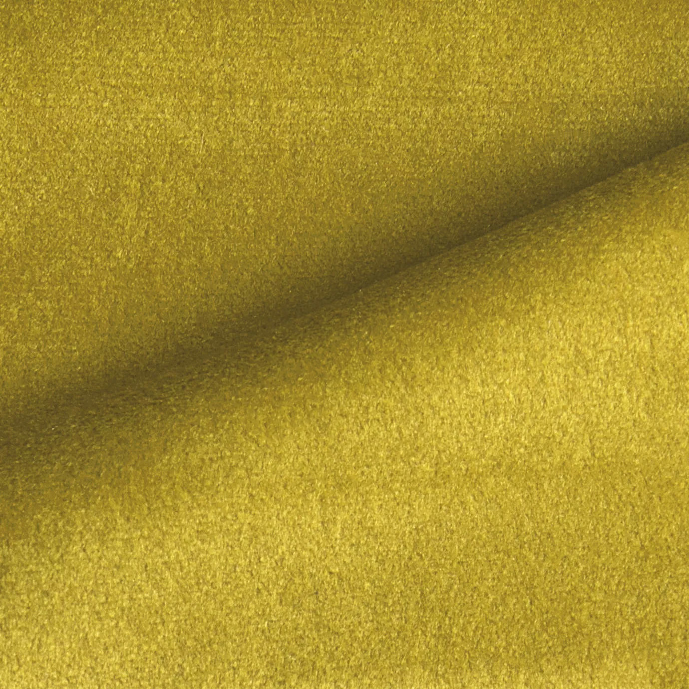 Elegant close-up of a Radiance Velvet Lime fabric swatch in a vibrant and luminous lime green tone, showcasing its velvety texture and the gentle folds that highlight its vivacity and freshness.