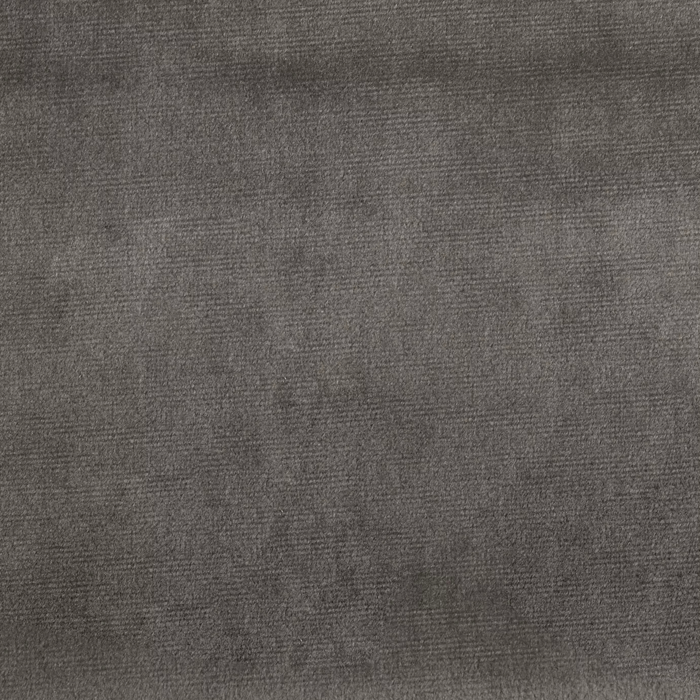 Elegant close-up of a Paris Velvet Anthracite fabric swatch in a sophisticated and dark anthracite tone, showcasing its velvety texture and a subtle sheen that gives it a feeling of comfort and modern elegance.