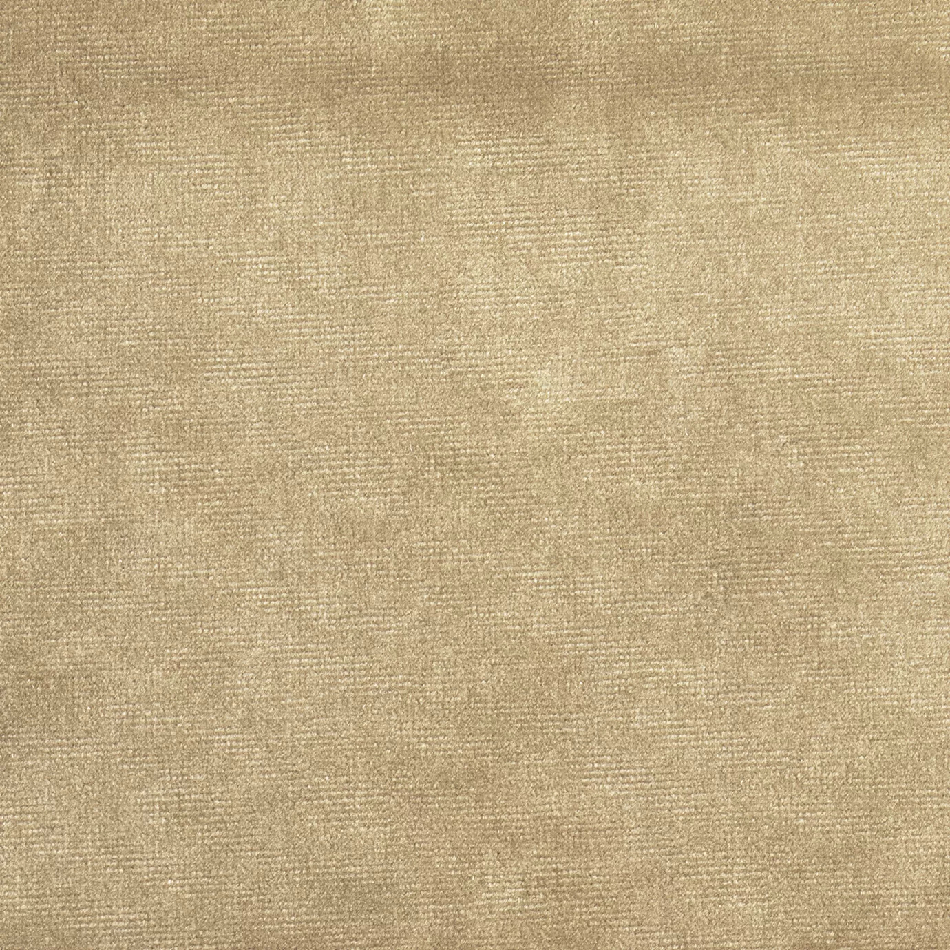 Elegant close-up of a Paris Velvet Champagne fabric swatch in a soft and luminous champagne tone, showcasing its velvety texture and a subtle sheen that gives it a feeling of comfort and sophisticated elegance.