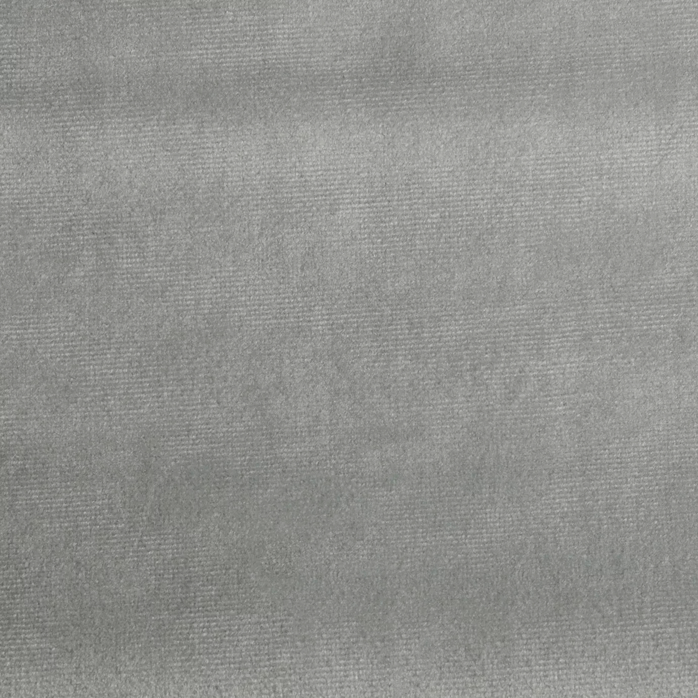 Elegant close-up of a Paris Velvet Light Blue fabric swatch in a soft and light blue tone, showcasing its velvety texture and a subtle sheen that gives it a feeling of comfort and serene elegance.