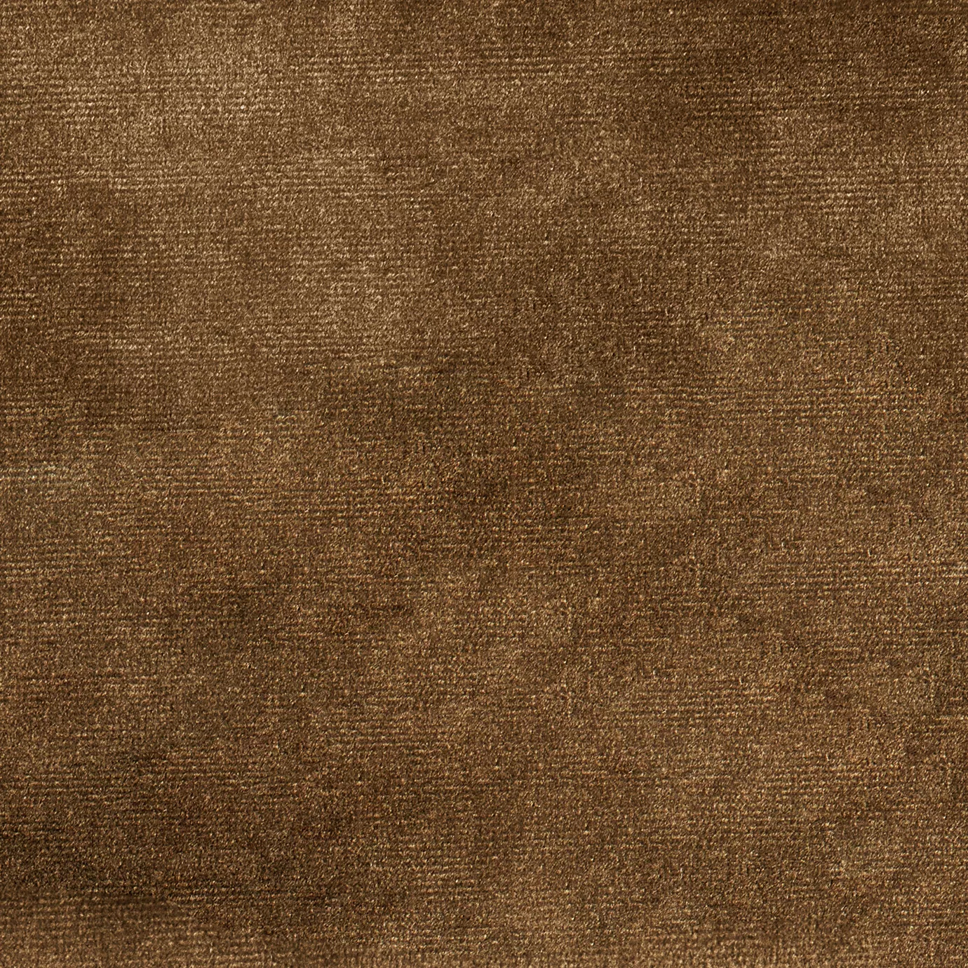 Elegant close-up of a Paris Velvet Teja fabric swatch in a soft and warm tile red tone, showcasing its velvety texture and a subtle sheen that gives it a feeling of comfort and natural, welcoming elegance.