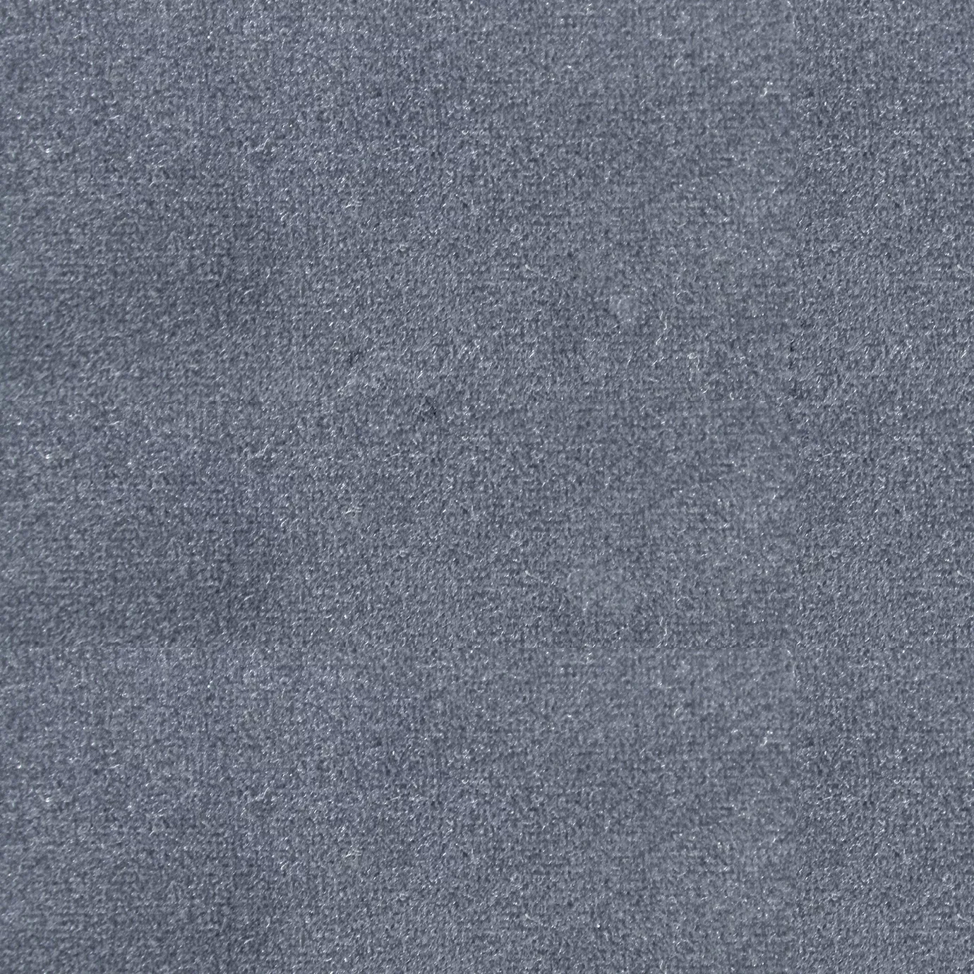 Soft and elegant close-up of a Lux Velvet Cloudy Blue 6030 fabric swatch in a soft and sophisticated gray-blue tone, showcasing its velvety texture and a delicate sheen that gives it a feeling of comfort and natural elegance.