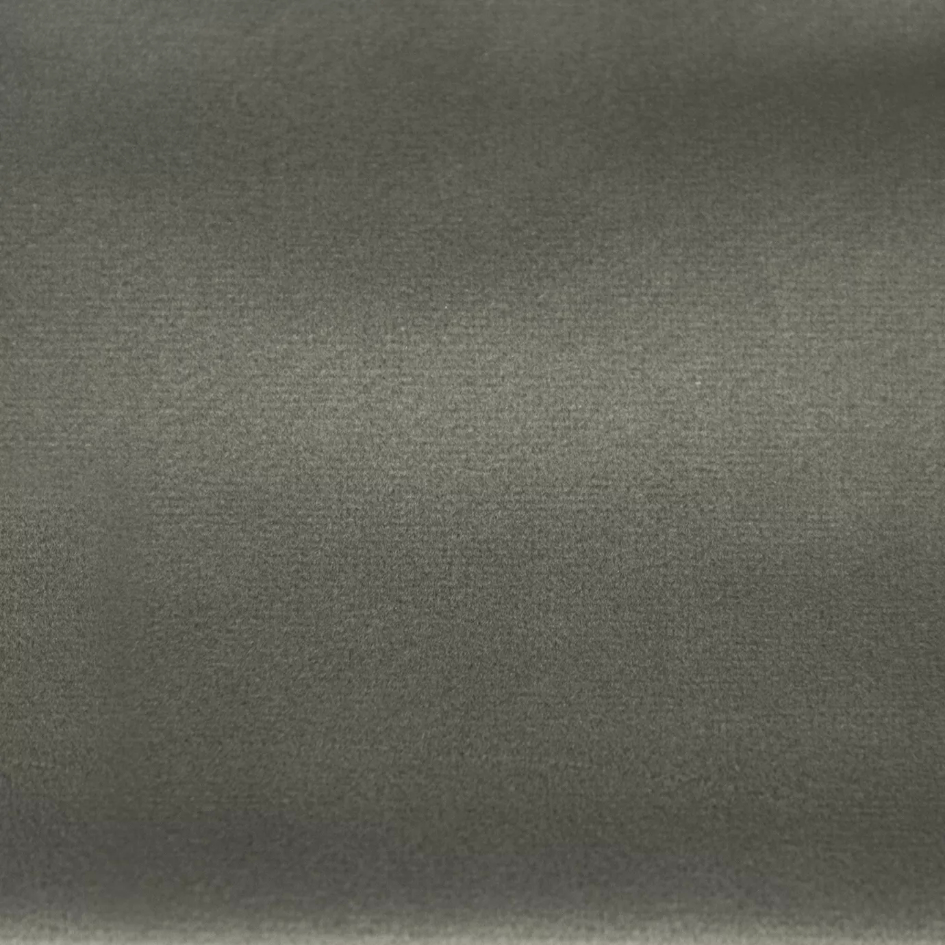 Soft and elegant close-up of a Lux Velvet Steal 0886 fabric swatch in a sophisticated and timeless steel gray tone, showcasing its velvety texture and a delicate sheen that gives it a feeling of comfort and understated elegance.