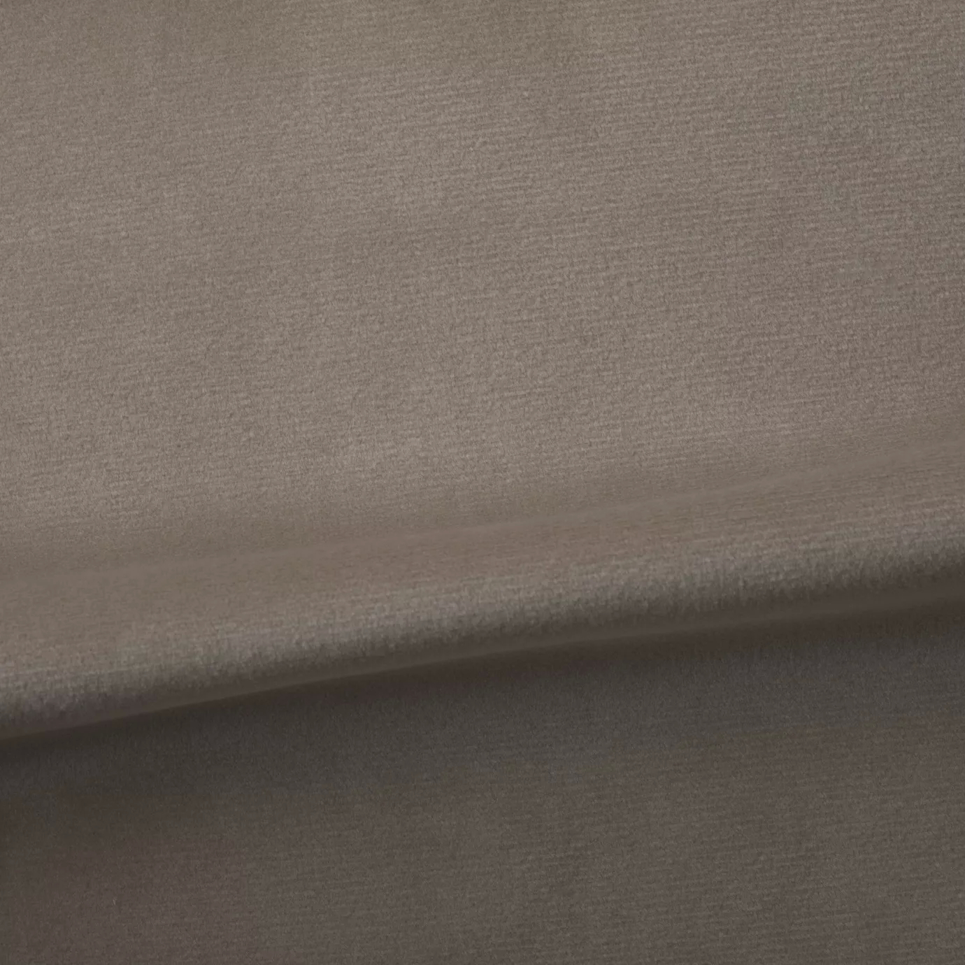 Soft and elegant close-up of a Venice Velvet 03 fabric swatch in a light and neutral brown tone, showcasing its velvety texture and a delicate sheen that gives it a feeling of comfort and understated elegance.