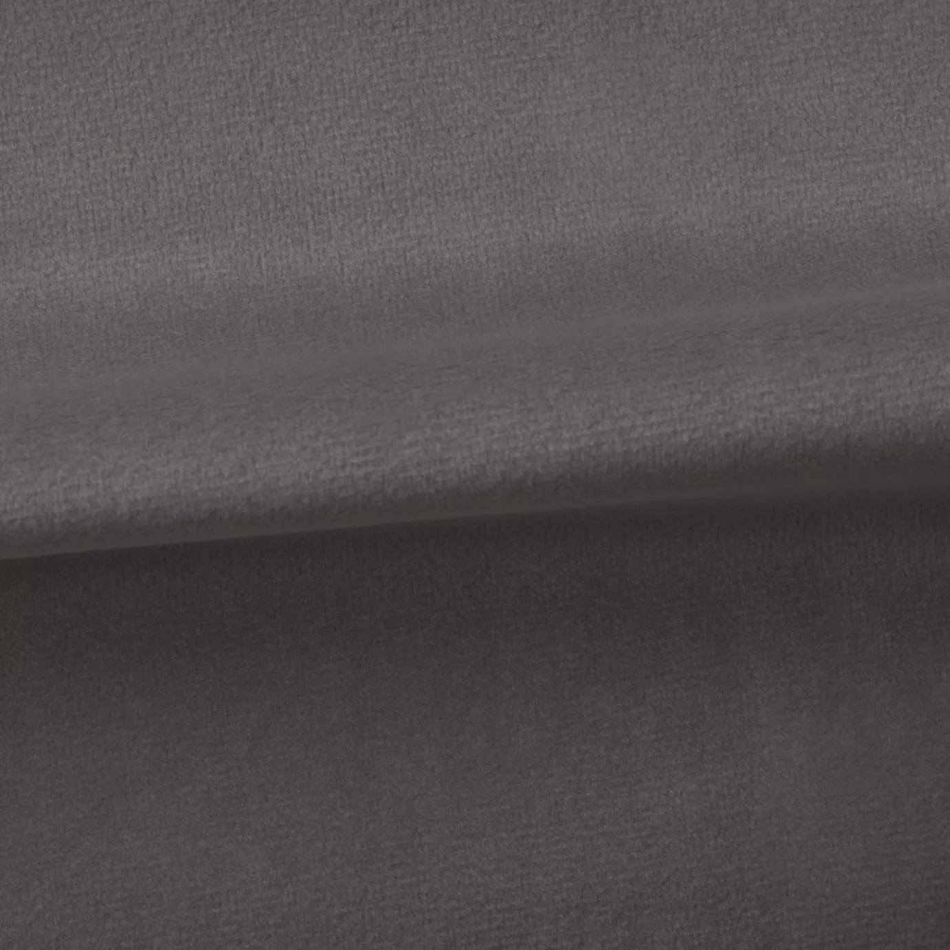 Soft and elegant close-up of a Venice Velvet 25 fabric swatch in a sophisticated and serene gray-mauve tone, showcasing its velvety texture and a delicate sheen that gives it a feeling of comfort and understated elegance.