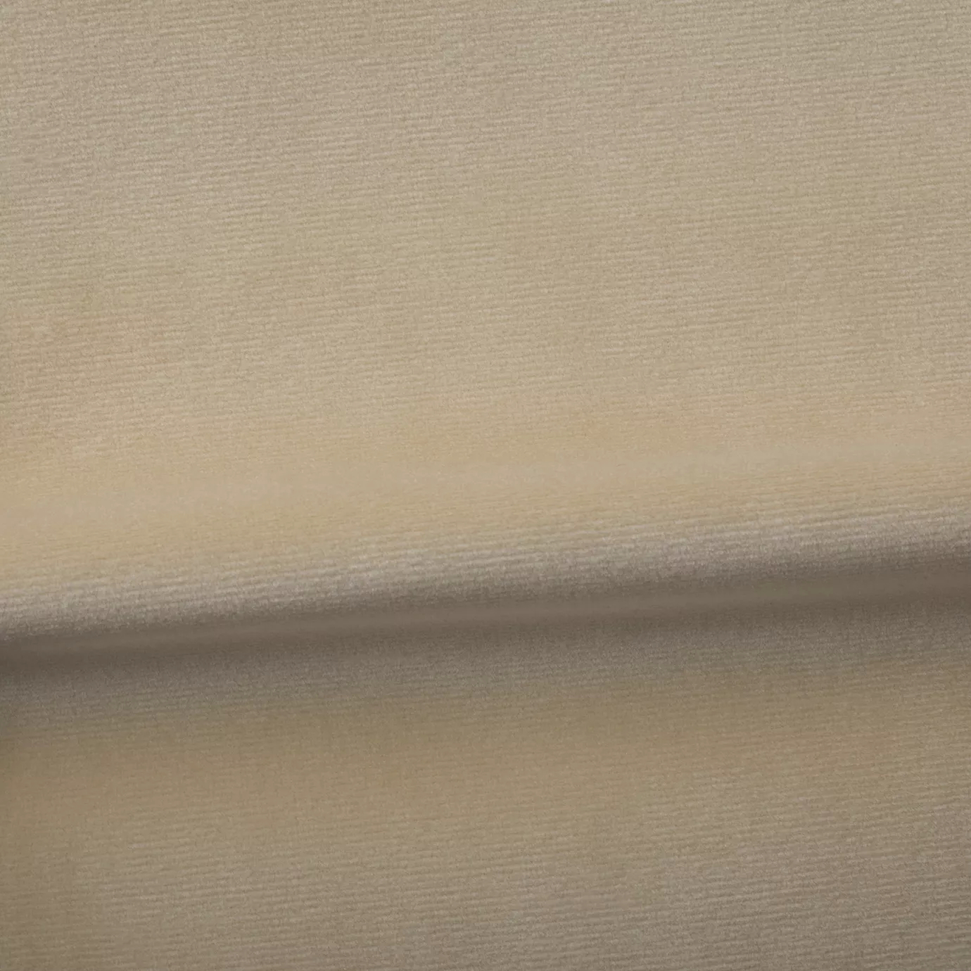 Soft and elegant close-up of a Venice Velvet 31 fabric swatch in a soft and neutral beige tone, showcasing its velvety texture and a delicate sheen that gives it a feeling of comfort and understated elegance.