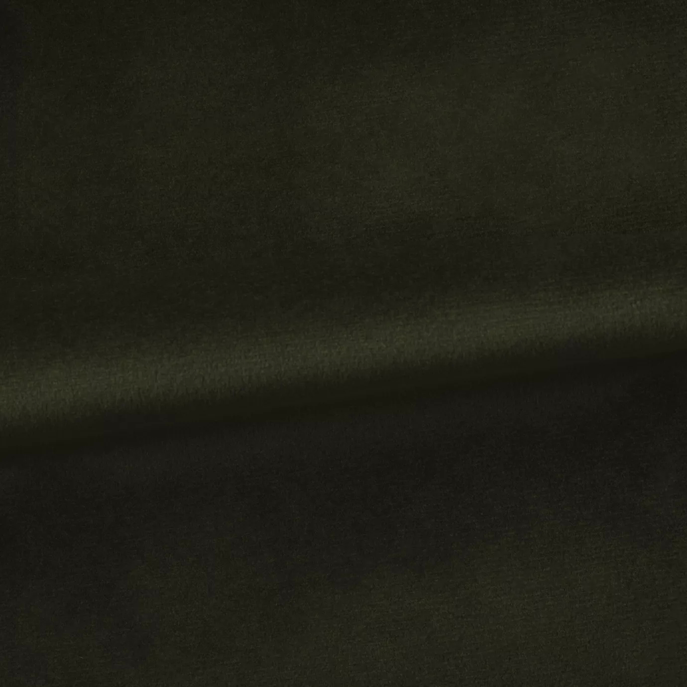 Soft and elegant close-up of a Venice Velvet 40 fabric swatch in a sophisticated and natural dark green tone, showcasing its velvety texture and a delicate sheen that gives it a feeling of comfort and earthy elegance.