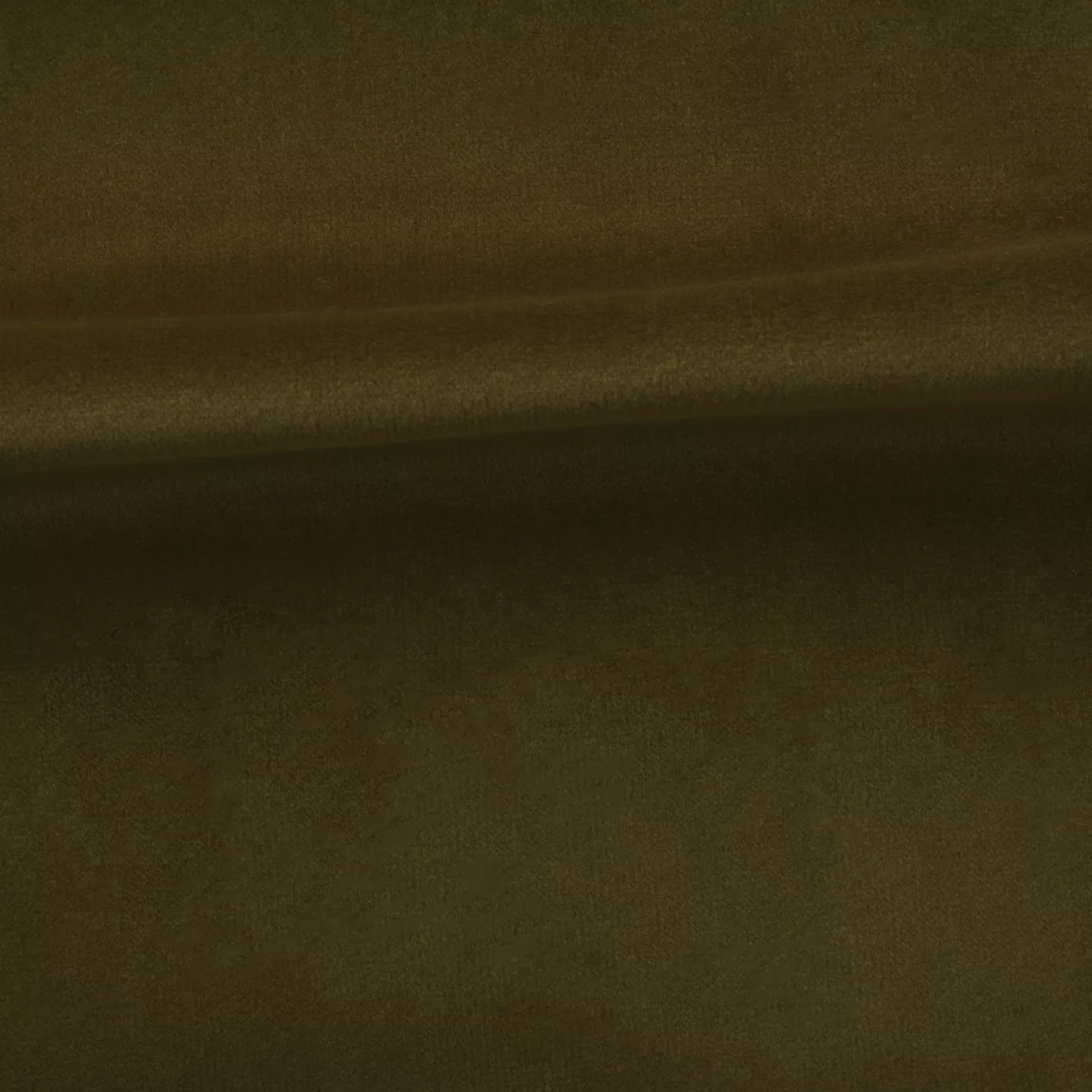Soft and elegant close-up of a Venice Velvet 44 fabric swatch in a sophisticated and natural olive green tone, showcasing its velvety texture and a delicate sheen that gives it a feeling of comfort and earthy elegance.