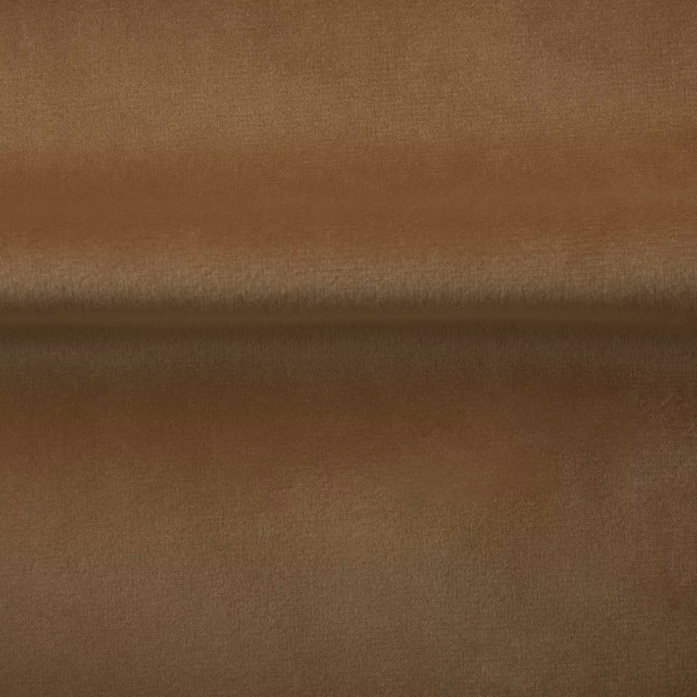Soft and elegant close-up of a Venice Velvet 46 fabric swatch in a soft and sophisticated golden brown tone, showcasing its velvety texture and a delicate sheen that gives it a feeling of comfort and natural elegance.