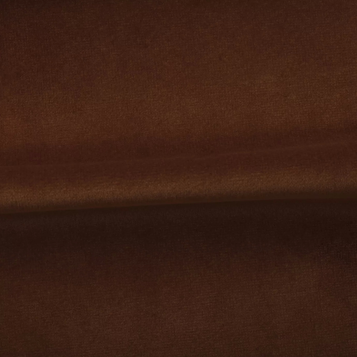Soft and elegant close-up of a Venice Velvet 48 fabric swatch in a warm and sophisticated reddish-brown tone, showcasing its velvety texture and a delicate sheen that gives it a feeling of comfort and natural elegance.