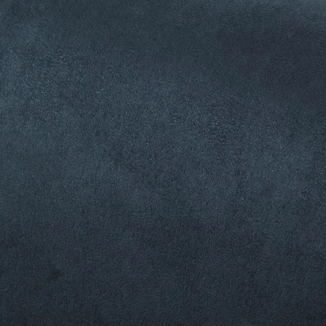Soft close-up of an Ultra Suede Midnight fabric swatch in a deep and sophisticated midnight blue tone, showcasing its delicate texture and a gentle touch that gives it a feeling of comfort and timeless elegance.