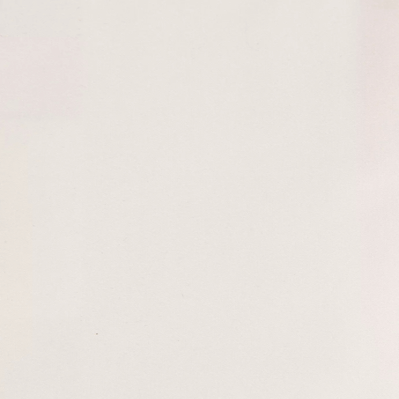 Soft close-up of a Satina Lux Dirty White fabric swatch in a slightly grayish and elegant white tone, showcasing its smooth texture and a subtle sheen that gives it a feeling of sophistication and purity.