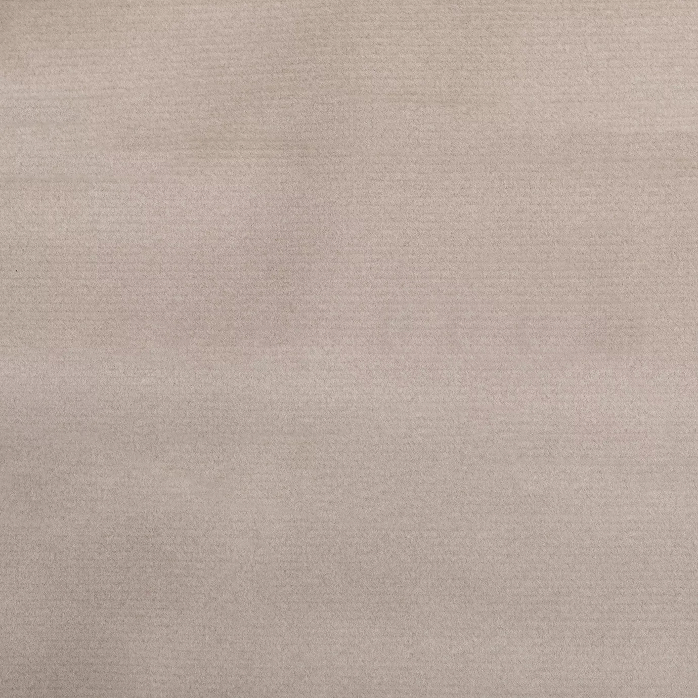 Soft close-up of a Smooth Velvet Beige fabric swatch in a light and elegant beige tone, showcasing its velvety texture and a gentle sheen that gives it a feeling of sophistication and natural comfort.