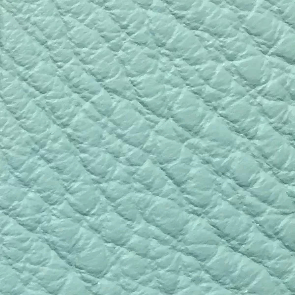 Close-up Harbor Capri: soft light blue, textured and elegant. Soft sheen enhances depth.