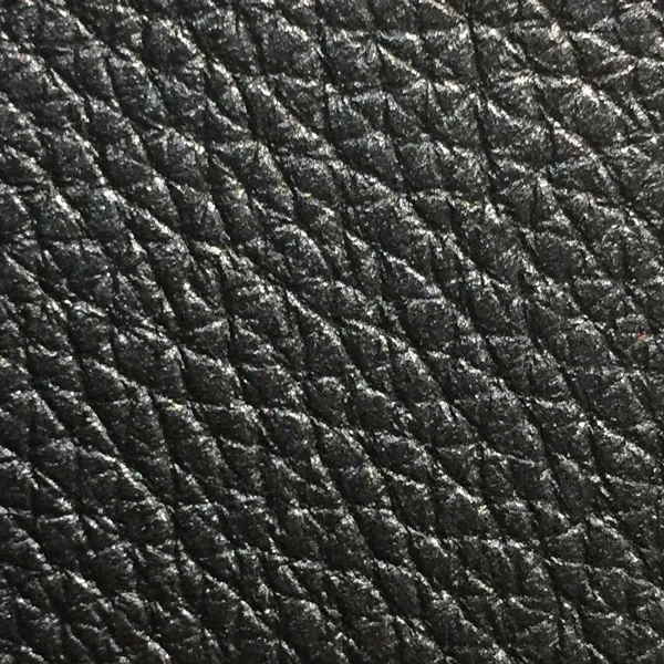 Close-up Harbor Deep Iron: soft and intense black, textured and elegant. Soft sheen enhances depth.