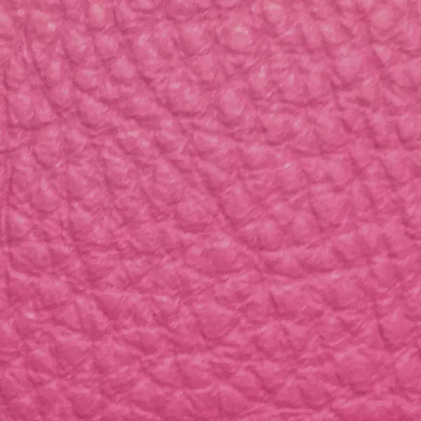 Close-up of a Harbor Rose Violet fabric swatch in a vibrant rose-violet tone with texture, showcasing its raised areas and grooves that give it a natural and elegant feel. The soft sheen highlights the depth of its texture.