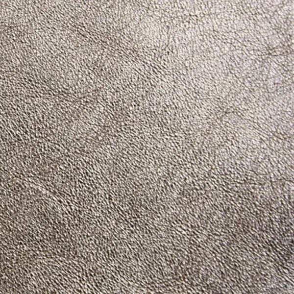 Close-up Metal Peltre: soft metallic pewter, textured and elegant. Soft sheen enhances depth.