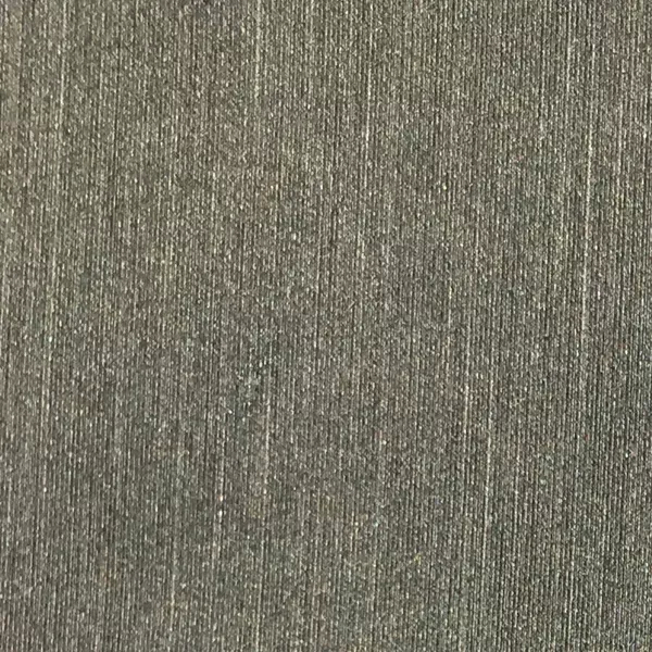 A detailed view of Pearl Synthetic Leather in a muted gray shows a fine, vertical ribbed texture with a subtle, soft sheen.